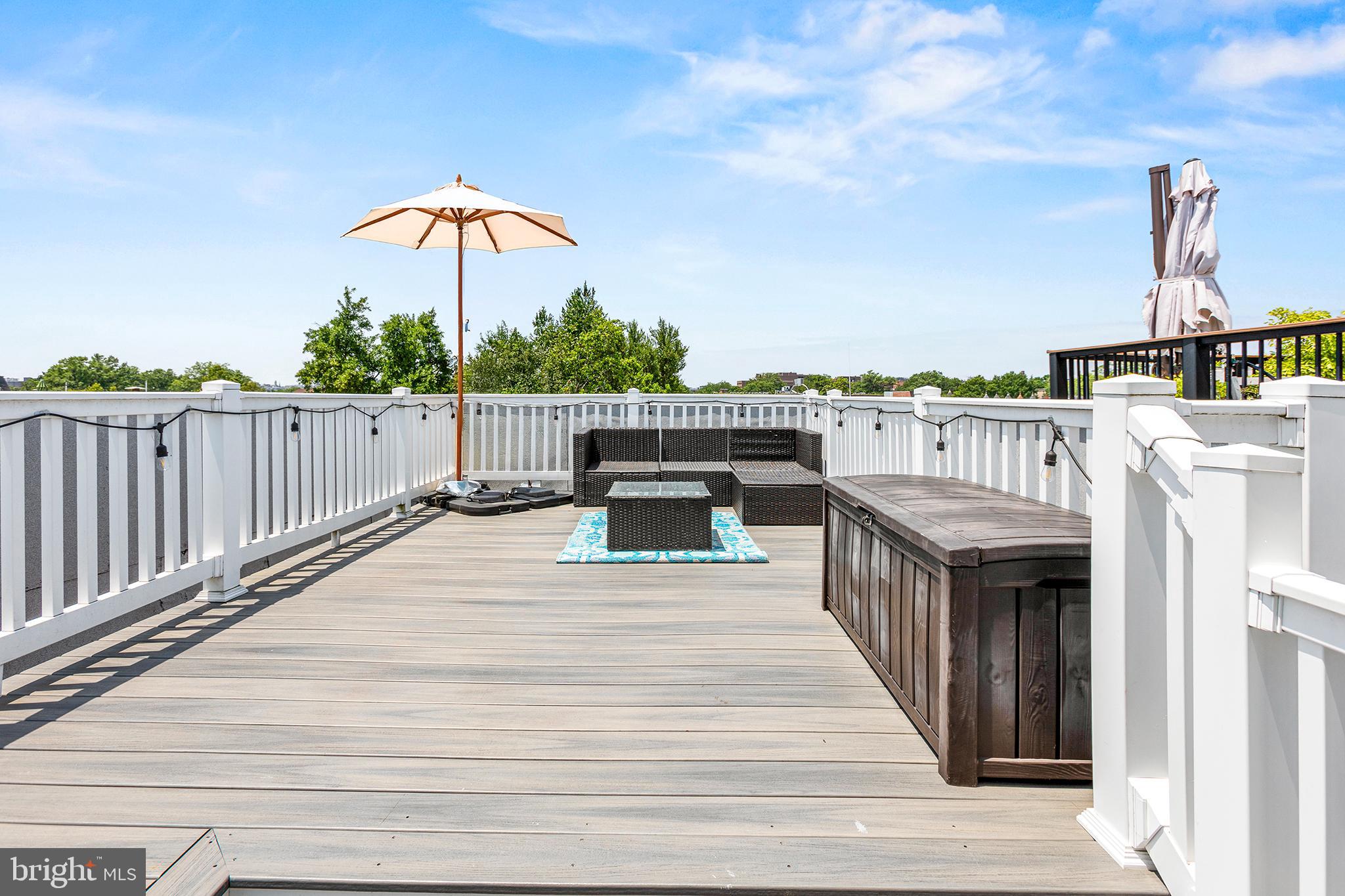 1922 1st Street Northwest, Unit B Washington, DC 20001 - Photo 38 of 49 Sunny deck with stylish seating and shade.