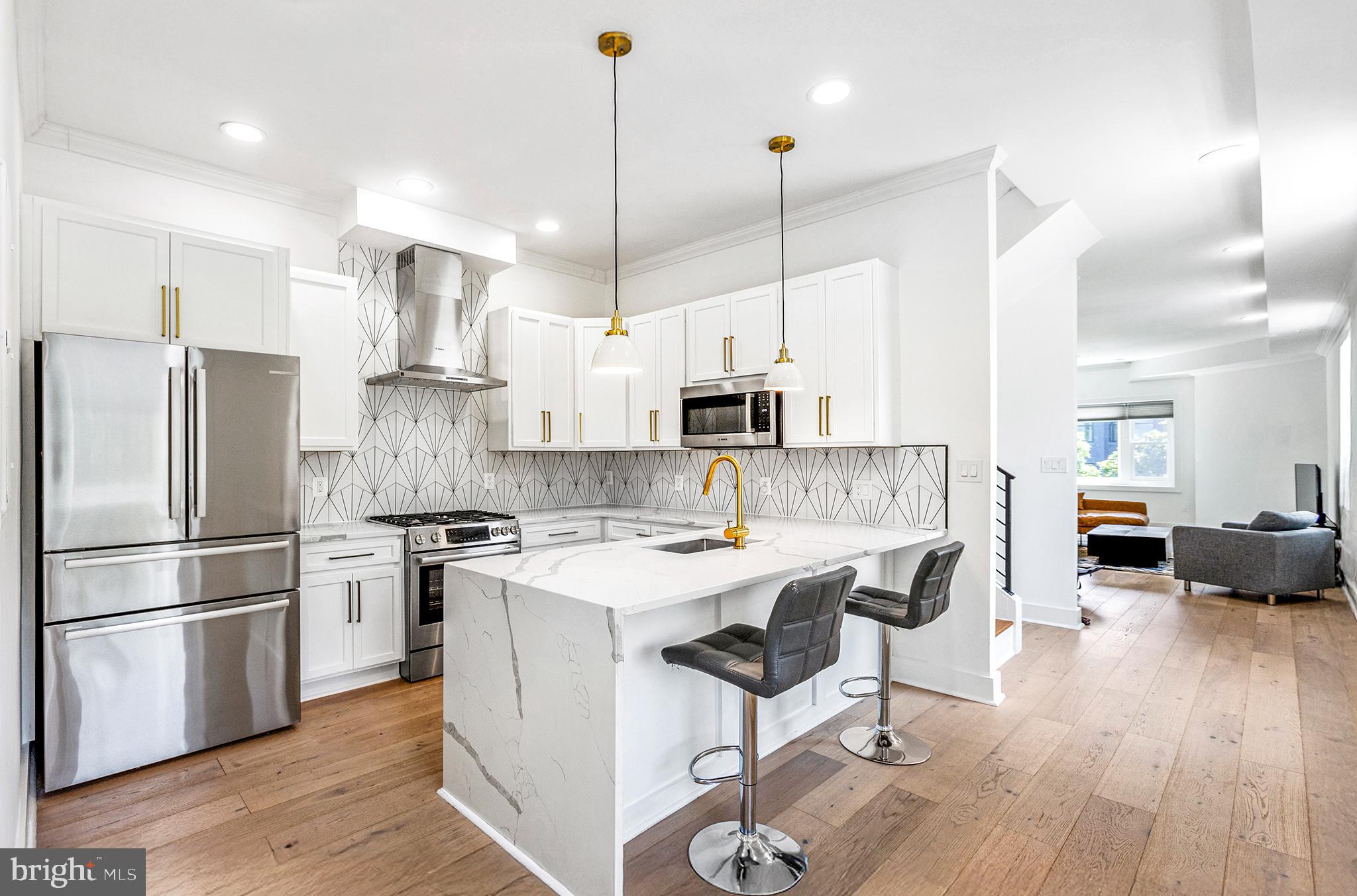 1922 1st Street Northwest, Unit B Washington, DC 20001 - Photo 8 of 49 Modern kitchen with sleek finishes.