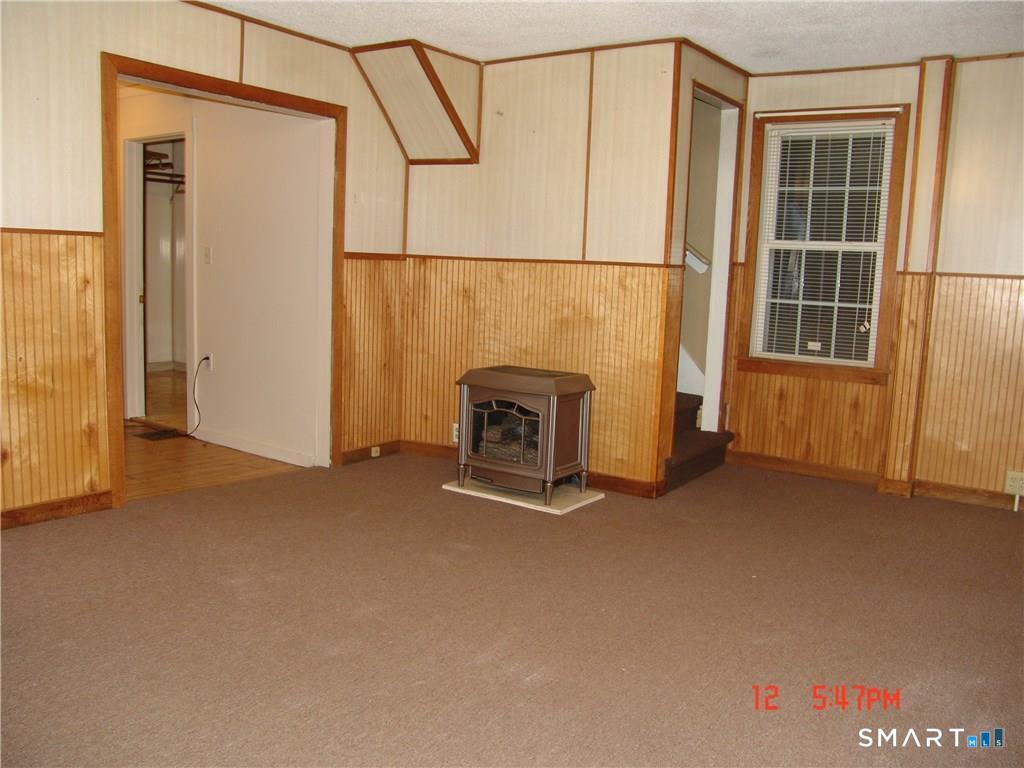 641 Wauregan Road Brooklyn, CT 06234 - Photo 12 of 22 Unit A, Livingroom. Pictures are when unit was vacant. Currently Occupied.