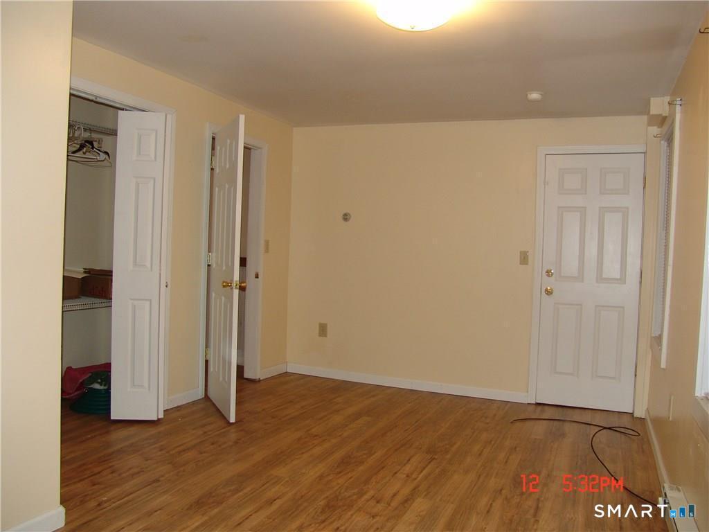 641 Wauregan Road Brooklyn, CT 06234 - Photo 16 of 22 Unit B, Bedroom. Pictures are when unit was vacant. Currently Occupied.