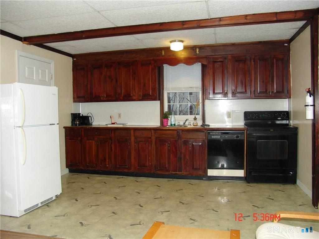 641 Wauregan Road Brooklyn, CT 06234 - Photo 17 of 22 Unit B, Eat-in Kitchen. Pictures are when unit was vacant. Currently Occupied.