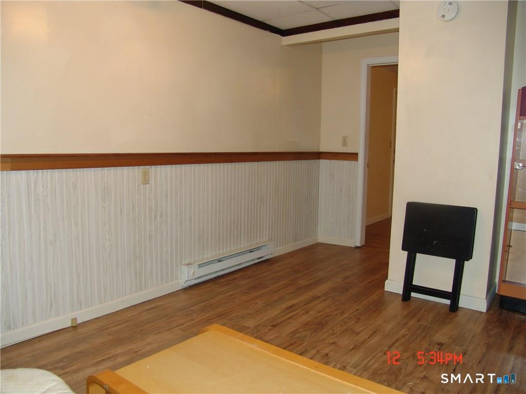 641 Wauregan Road Brooklyn, CT 06234 - Photo 18 of 22 Unit B, Kitchen-LR to Bedroom. Pictures are when unit was vacant. Currently Occupied.