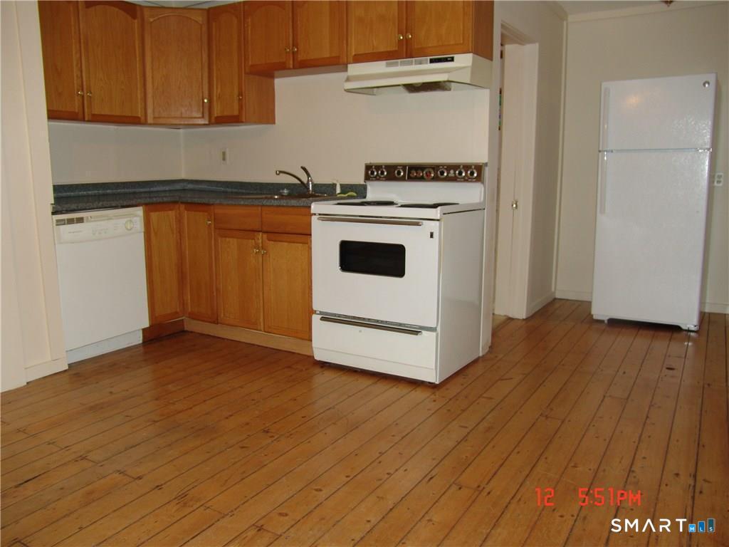 641 Wauregan Road Brooklyn, CT 06234 - Photo 10 of 22 Unit A, Kitchen. Pictures are when unit was vacant. Currently Occupied.