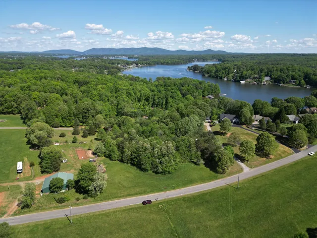 view of a city with lots of green space