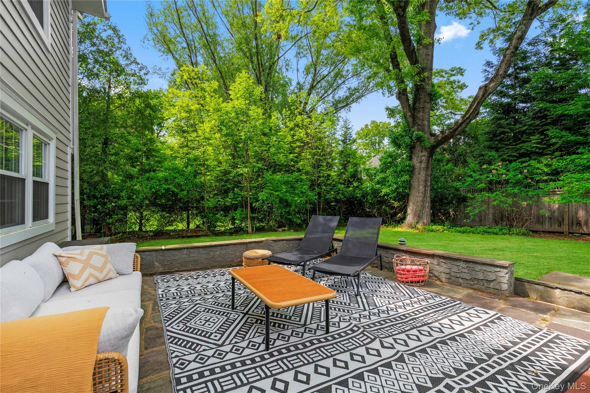 3 Lea Place Rye, NY 10580 - Photo 28 of 32 a view of backyard with swimming pool and green space