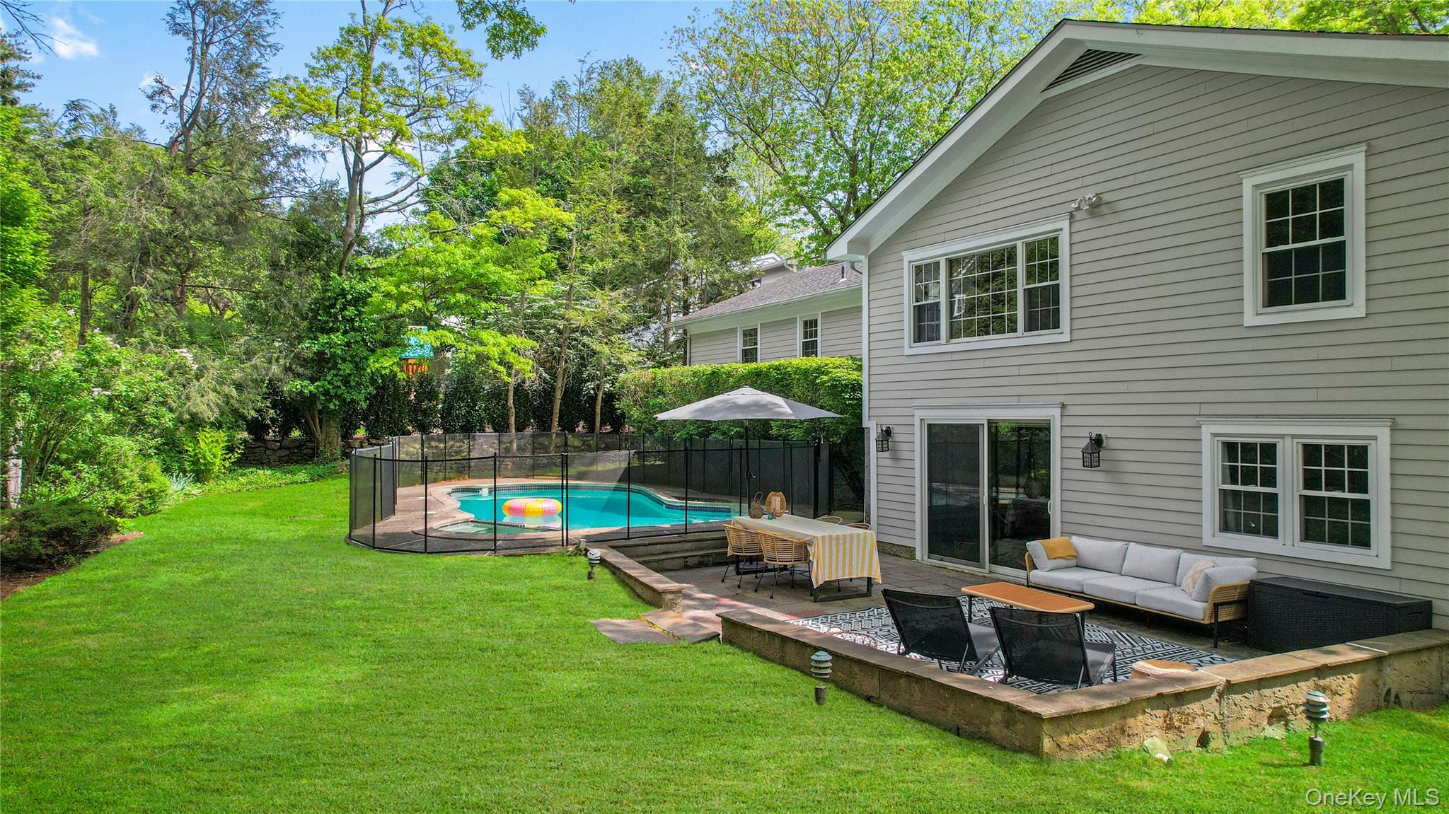 3 Lea Place Rye, NY 10580 - Photo 30 of 32 a front view of house with yard and outdoor seating
