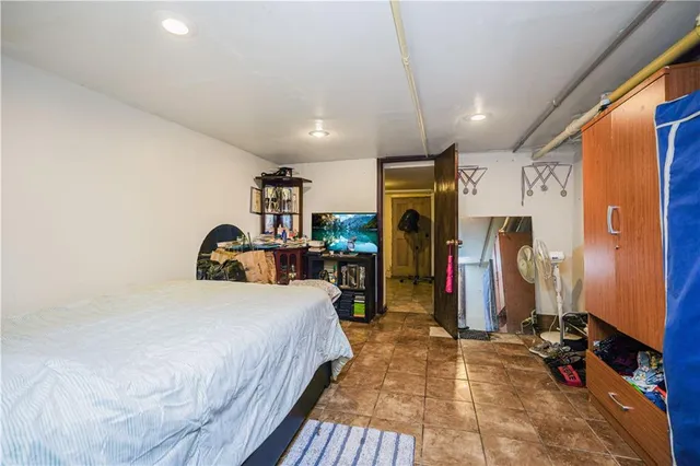 a bed room with a bed and a walk in closet