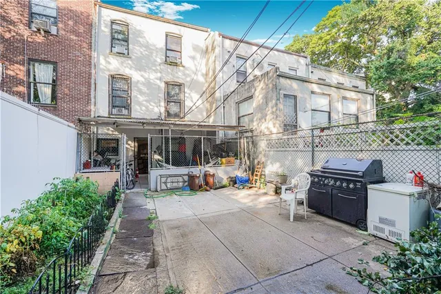 a view of a building with sitting area