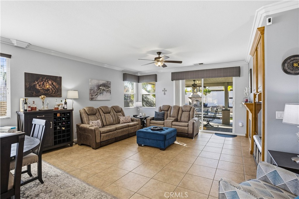 29183 Paperflower Lane Menifee, CA 92584 - Photo 11 of 49 a living room with furniture and a large window
