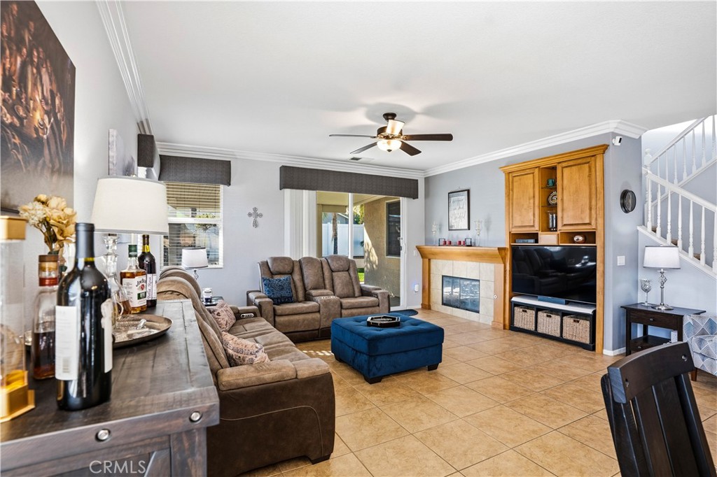 29183 Paperflower Lane Menifee, CA 92584 - Photo 12 of 49 a living room with furniture fireplace and flat screen tv