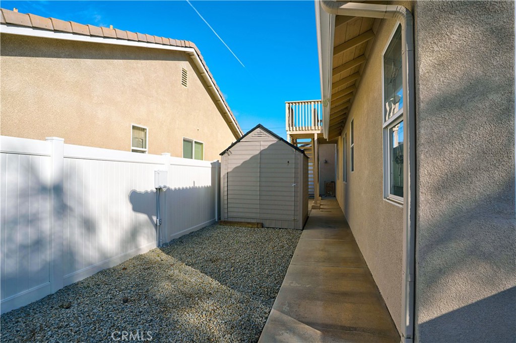 29183 Paperflower Lane Menifee, CA 92584 - Photo 42 of 49 a view of a house with a door