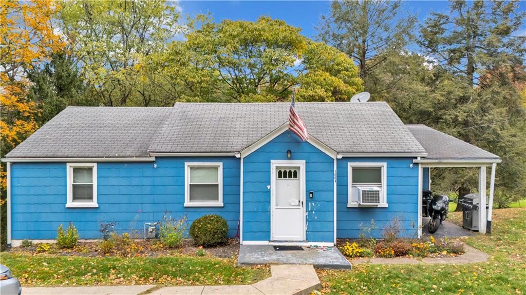 a house view with a garden space