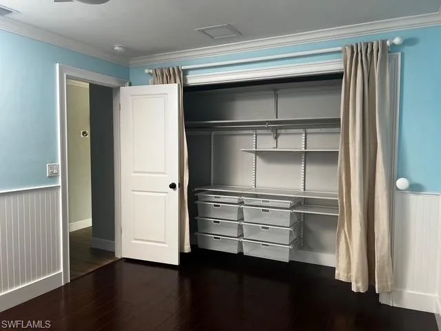 a storage room with wooden floor