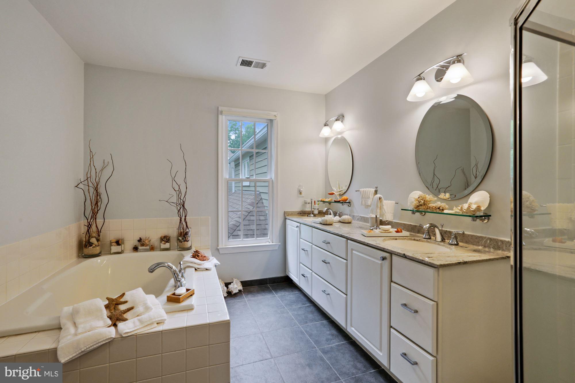 11412 Hollow Timber Way Reston, VA 20194 - Photo 22 of 59 Primary Bath W/ Soaking Tub and Double Sink Vanity