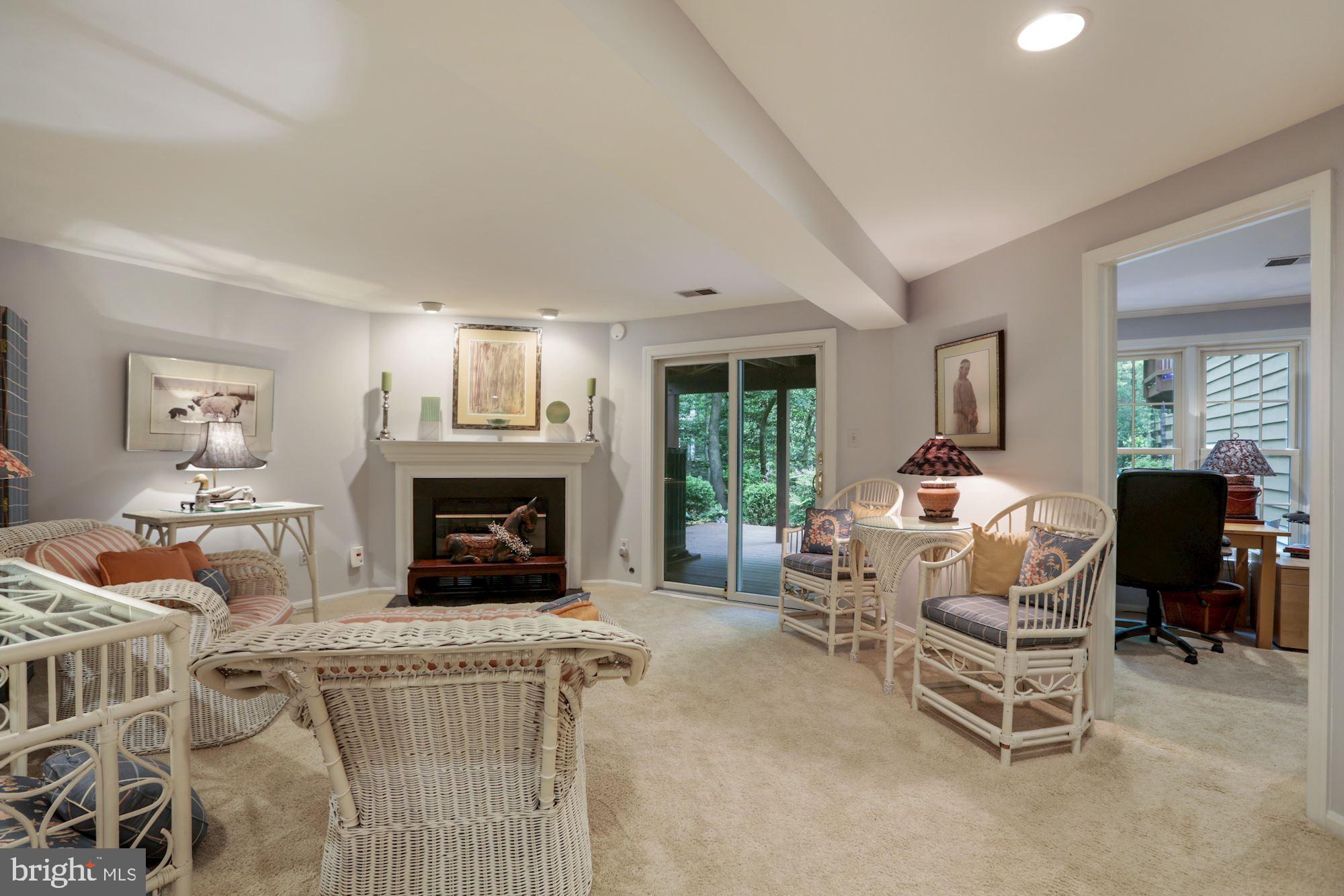 11412 Hollow Timber Way Reston, VA 20194 - Photo 29 of 59 Walkout Lower Level Recreation Room W/ Gas Firepla