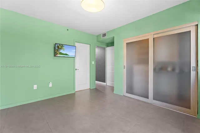 a bathroom with a sink mirror toilet and bathtub