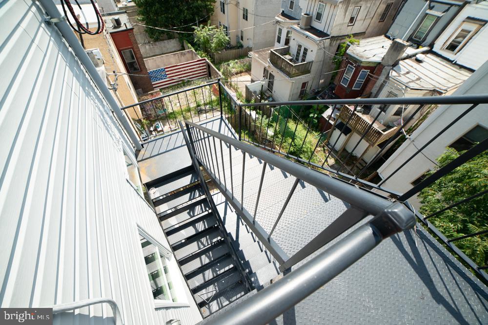 1848 North 16th Street, Unit 1 Philadelphia, PA 19121 - Photo 11 of 24 a view of a balcony with wooden floor