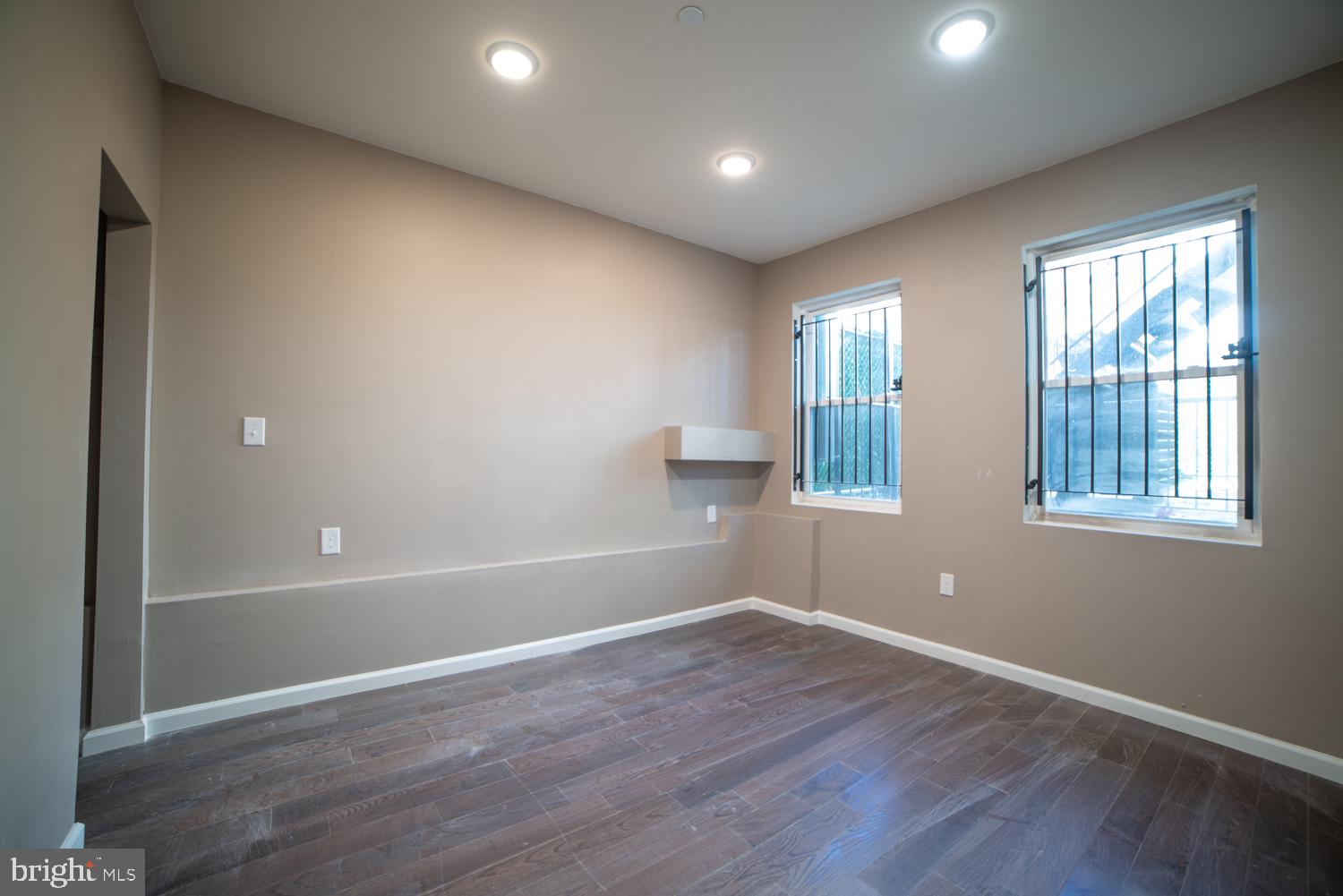 1848 North 16th Street, Unit 1 Philadelphia, PA 19121 - Photo 17 of 24 wooden floor in an empty room with a window