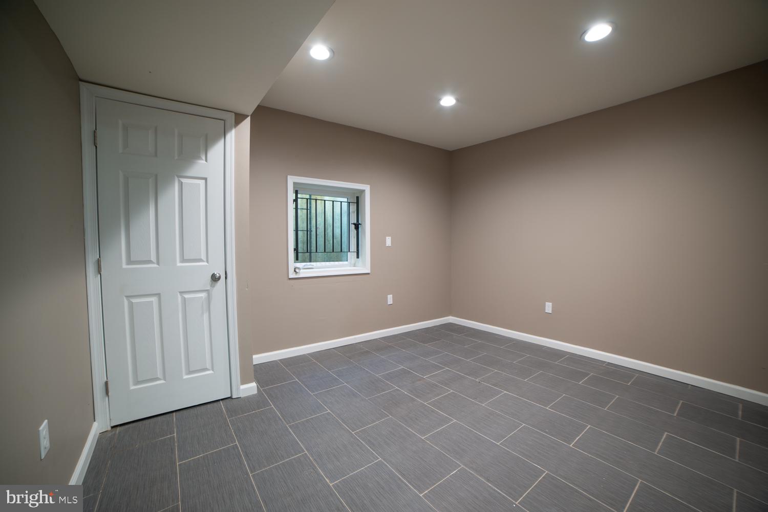 1848 North 16th Street, Unit 1 Philadelphia, PA 19121 - Photo 24 of 24 an empty room with windows