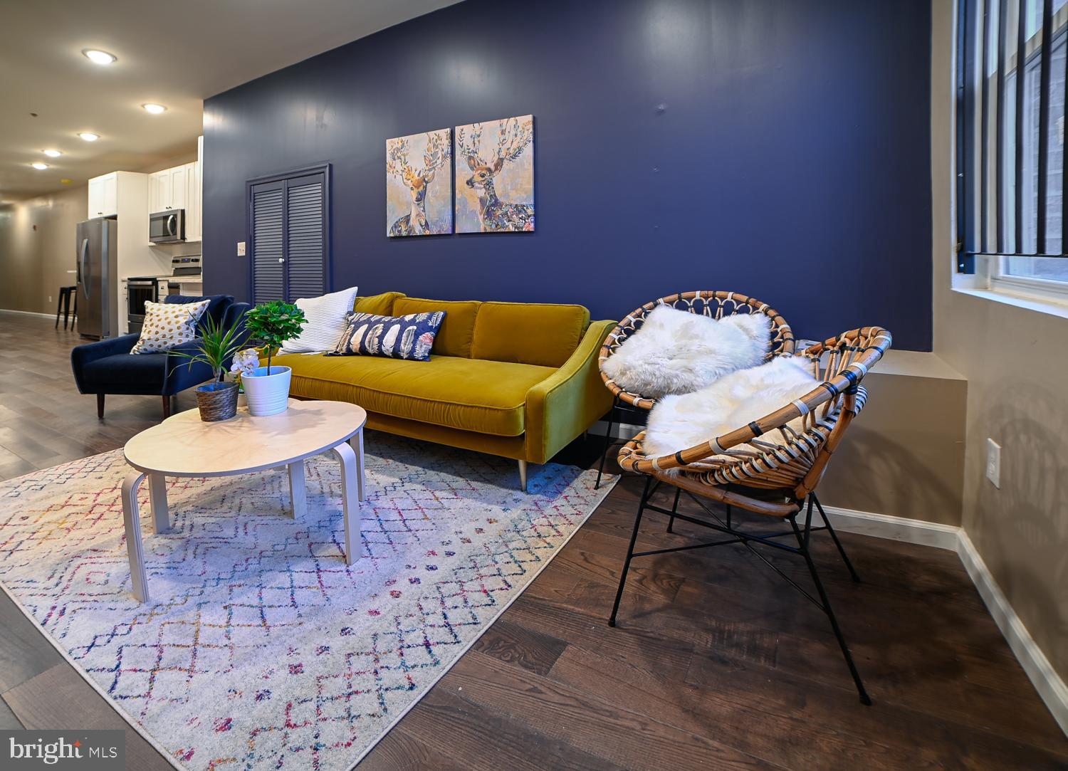 1848 North 16th Street, Unit 1 Philadelphia, PA 19121 - Photo 3 of 24 a living room with furniture and a rug