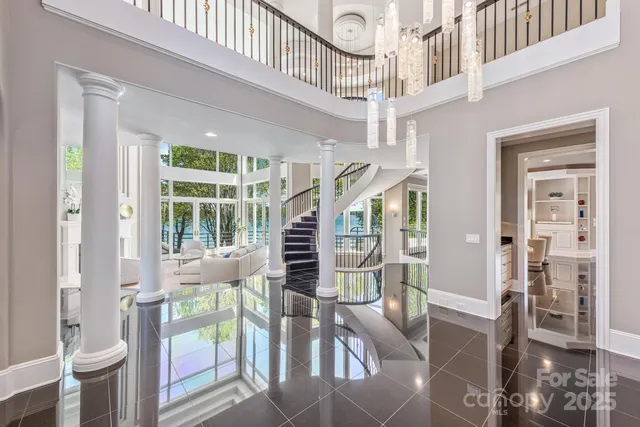 a view of entryway livingroom and hall with wooden floor