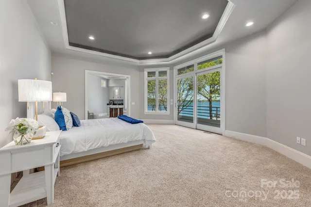 a bed room with a bed and a window