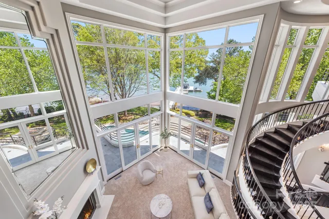 a room with furniture and a large window