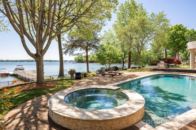 a view of a swimming pool with a patio
