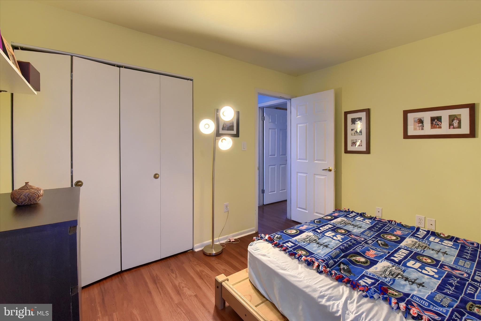 704 Cedar Ridge Lane Mechanicsburg, PA 17055 - Photo 30 of 40 a bedroom with a bed and a dresser