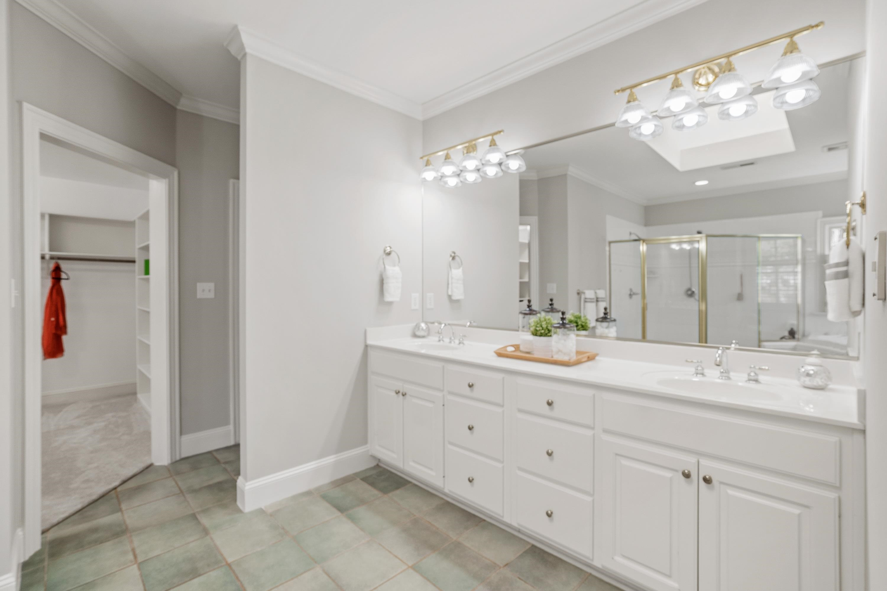 4732 Sharpstone Lane Raleigh, NC 27615 - Photo 37 of 76 Bathroom Access to Walk In Closet