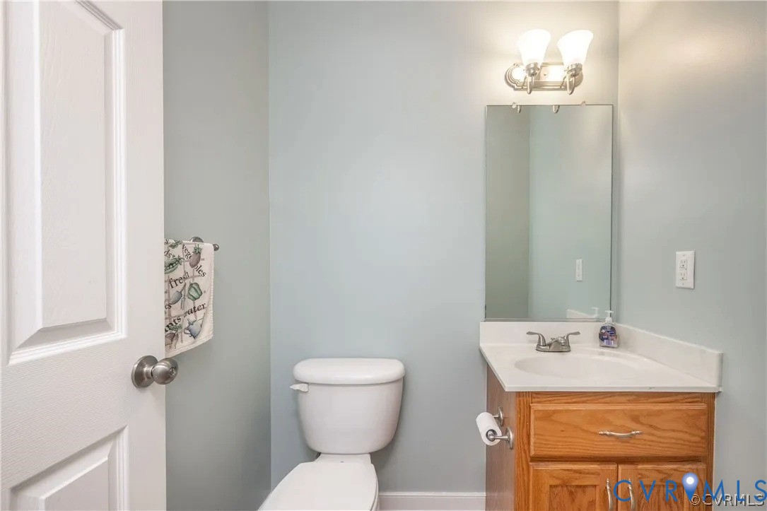 1733 Lakeview Avenue Richmond, VA 23220 - Photo 12 of 28 a bathroom with a granite countertop sink toilet and shower