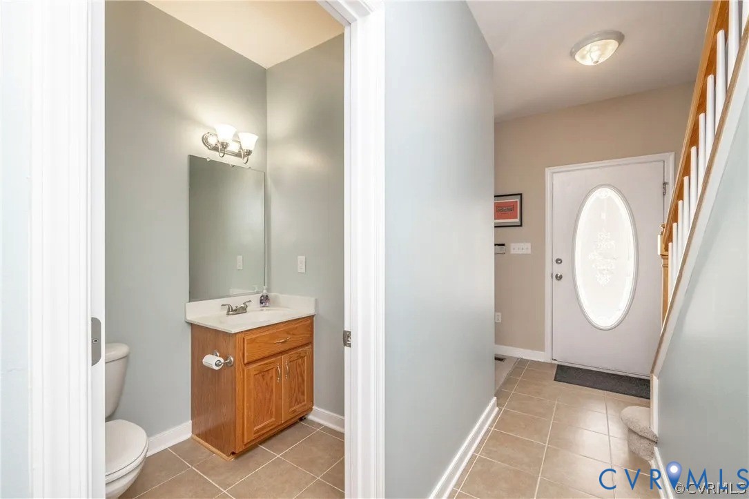 1733 Lakeview Avenue Richmond, VA 23220 - Photo 13 of 28 a view of a bathroom with mirror and sink
