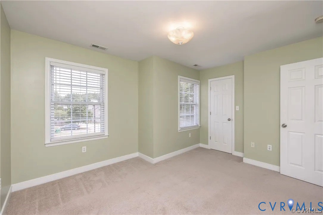 1733 Lakeview Avenue Richmond, VA 23220 - Photo 20 of 28 a view of an empty room with a window