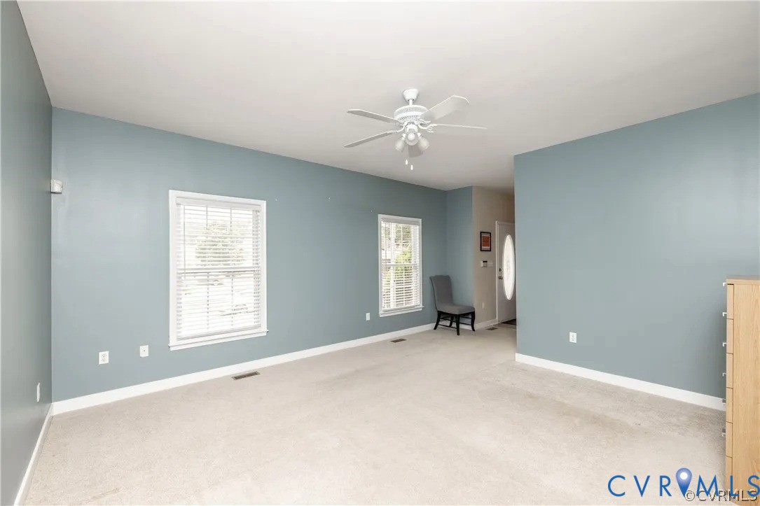 1733 Lakeview Avenue Richmond, VA 23220 - Photo 7 of 28 a view of an empty room with a window