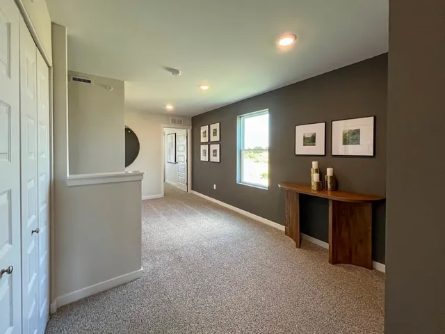 a view of an empty room and window