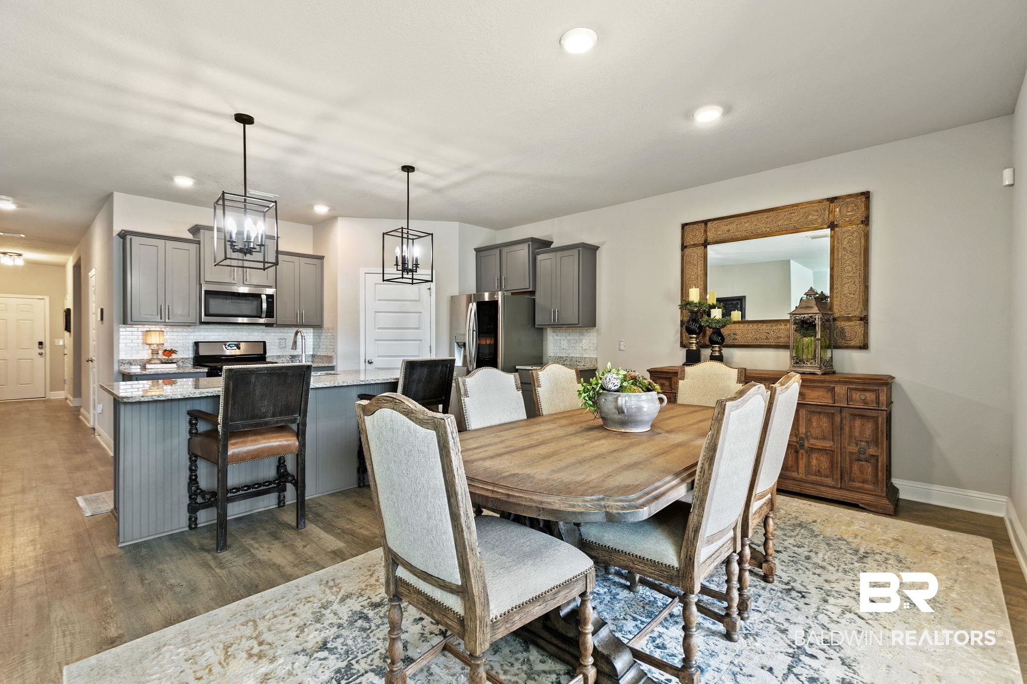31650 Memphis Loop Daphne, AL 36527 - Photo 15 of 68 Dining room with dark wood-style floors and hanging lights