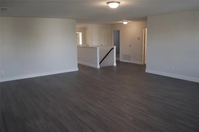 a view of bathroom with a sink and mirror