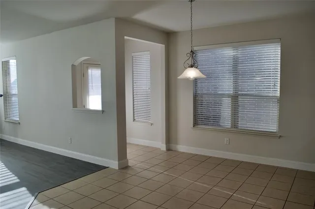 a kitchen with stainless steel appliances granite countertop a sink a microwave counter space and cabinets