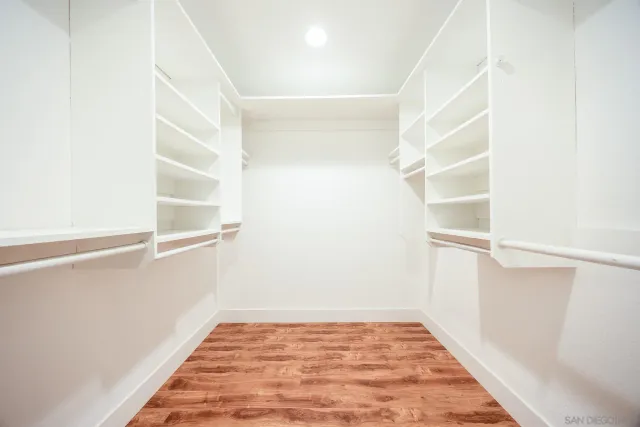 a view of an empty walk in closet