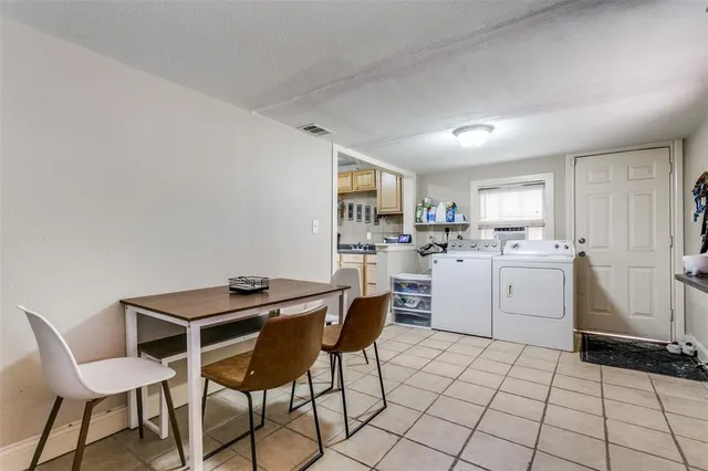 a bedroom with a bed and dresser