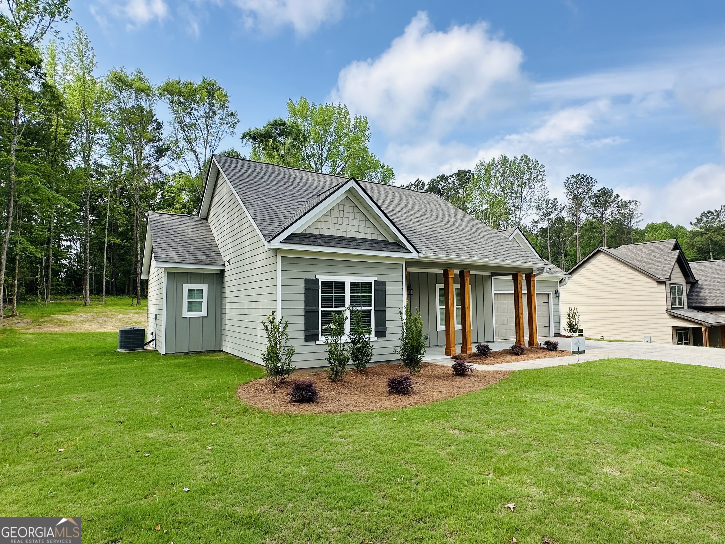 25 Patterson Drive Franklin, GA 30217 - Photo 5 of 36 a view of a house with a yard porch and sitting area