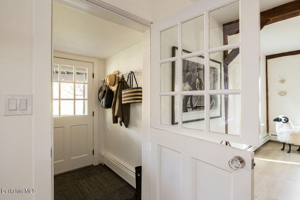 302 A Egremont Plain Road Egremont, MA 01230 - Photo 13 of 66 a view of walk in closet with clothes and shoes