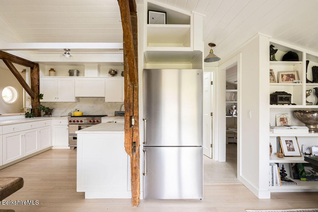 302 A Egremont Plain Road Egremont, MA 01230 - Photo 18 of 66 a kitchen with stainless steel appliances a refrigerator and cabinets