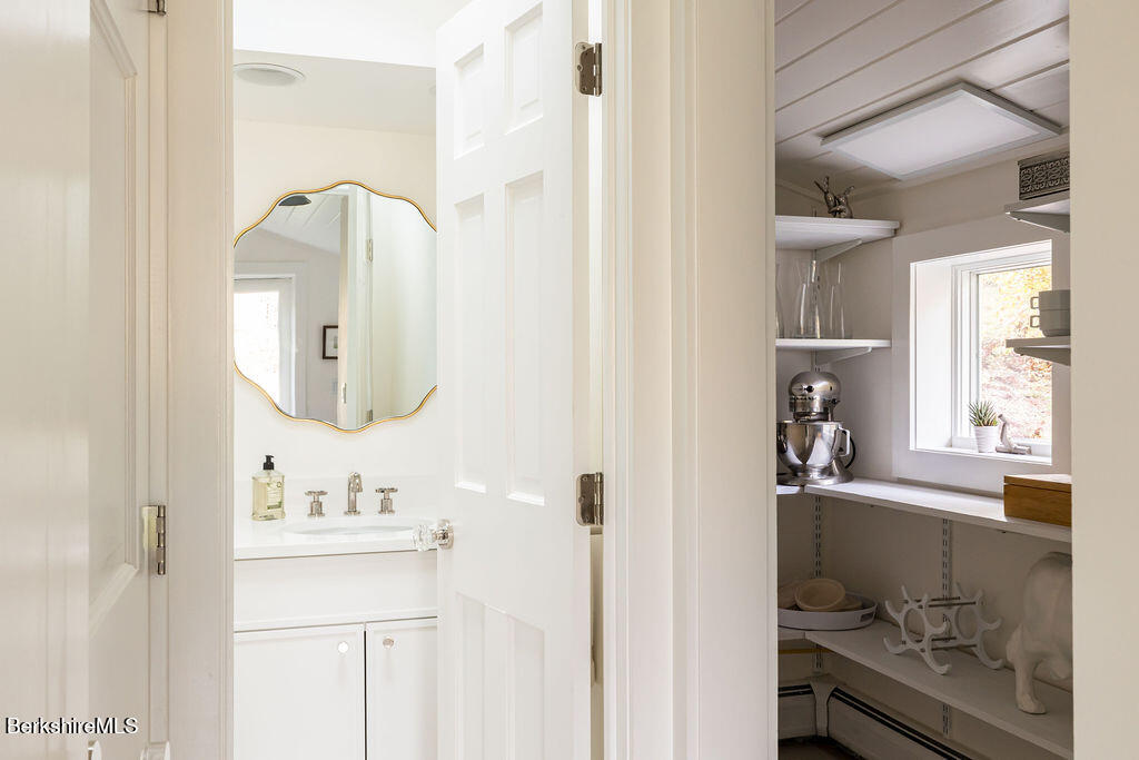 302 A Egremont Plain Road Egremont, MA 01230 - Photo 19 of 66 a bathroom with a sink a vanity and a mirror