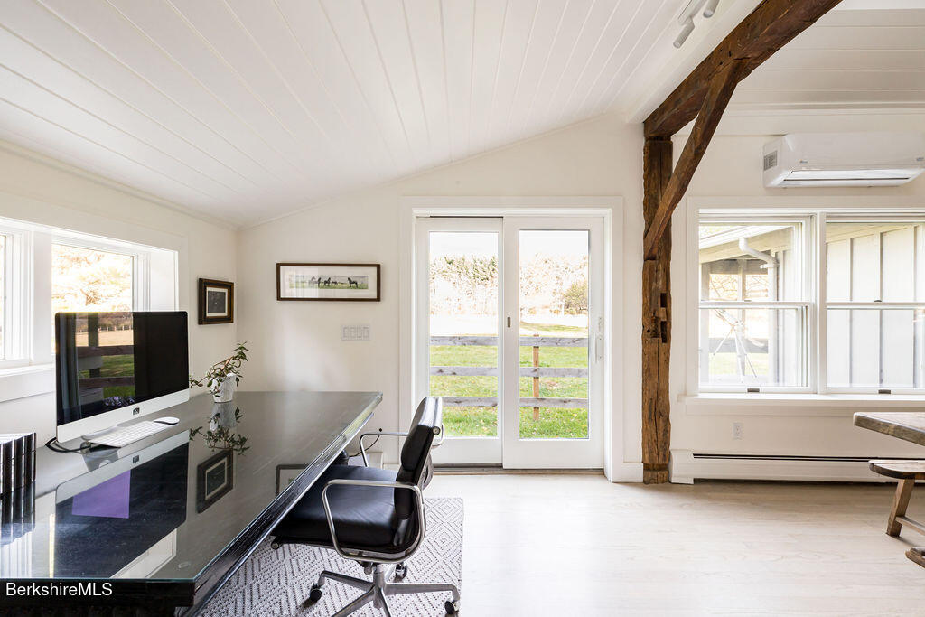 302 A Egremont Plain Road Egremont, MA 01230 - Photo 20 of 66 a view of a livingroom with workspace and a window