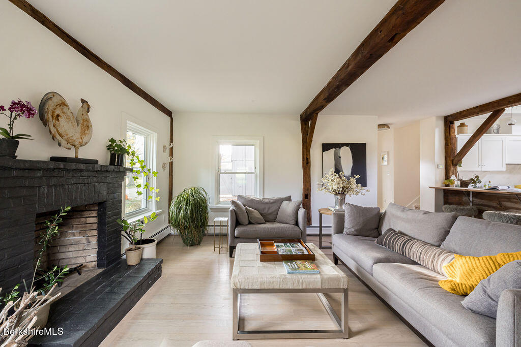 302 A Egremont Plain Road Egremont, MA 01230 - Photo 22 of 66 a living room with furniture and a fireplace
