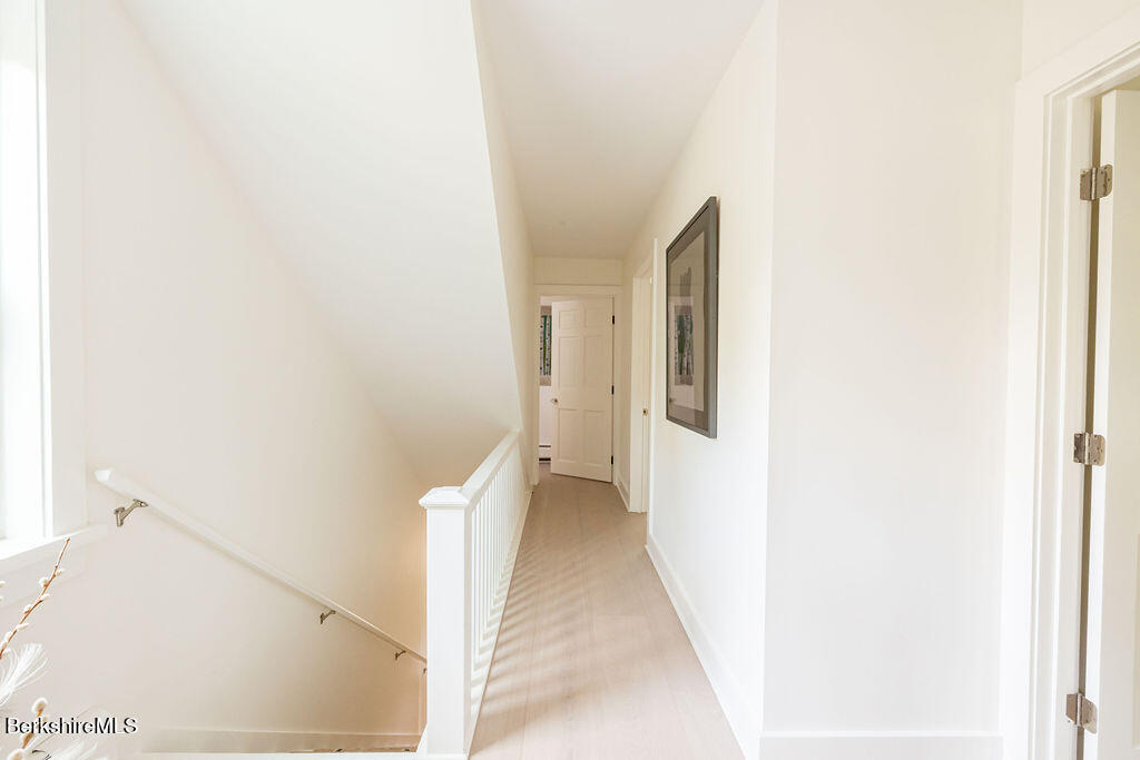 302 A Egremont Plain Road Egremont, MA 01230 - Photo 32 of 66 a view of a hallway with white walls