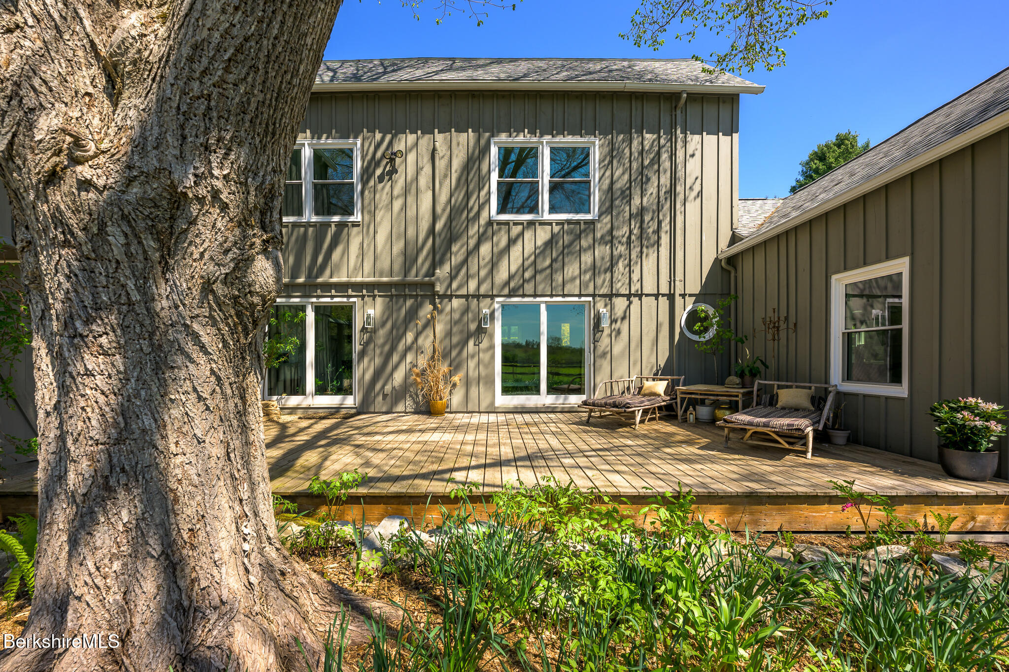 302 A Egremont Plain Road Egremont, MA 01230 - Photo 56 of 71 a view of a house with backyard and sitting area