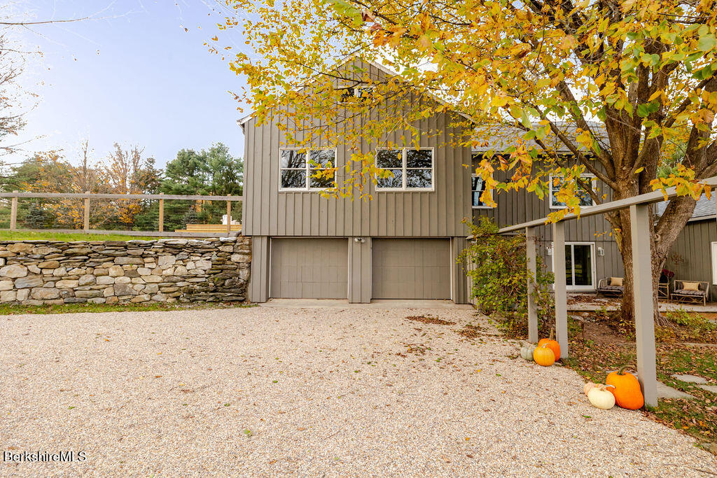 302 A Egremont Plain Road Egremont, MA 01230 - Photo 56 of 66 a view of a house with a patio