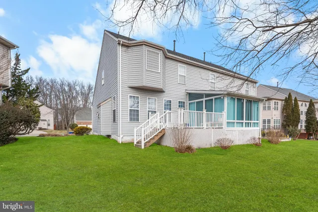 a view of outdoor space with deck and furniture